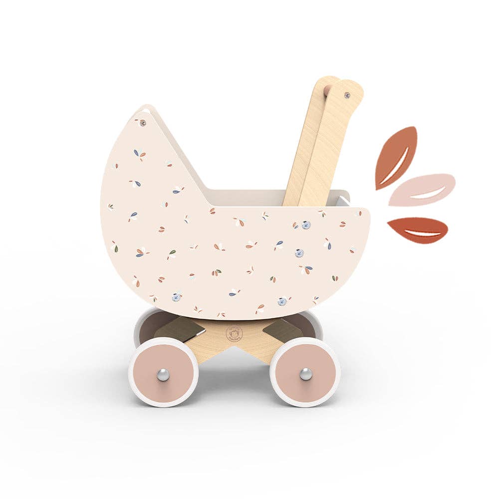 Wooden toy pram with terrazzo pattern on a white background