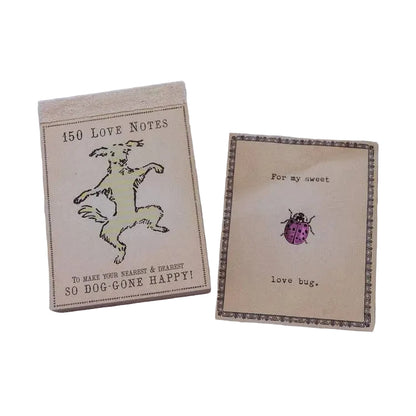 Set of love notes with illustrations on a marble surface