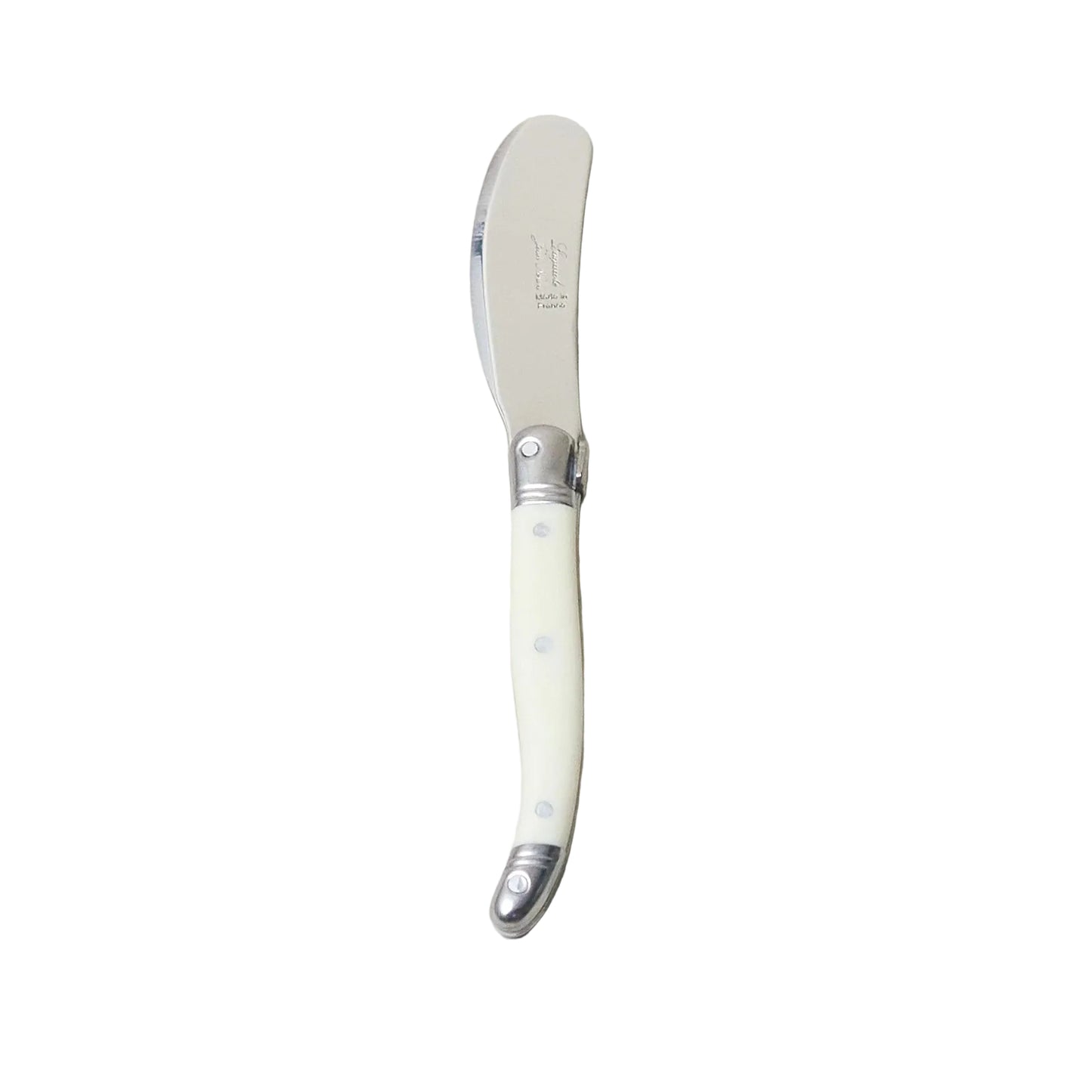 Butter knife with decorative handle on a light beige background