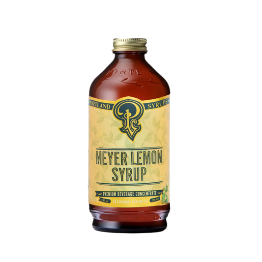 Bottle of Meyer Lemon Syrup with a yellow label on a white background
