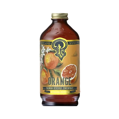Bottle of Portland Syrup with orange flavor on a white background
