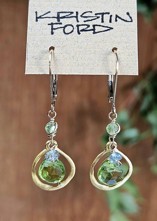 Floating Peridot in gold ring