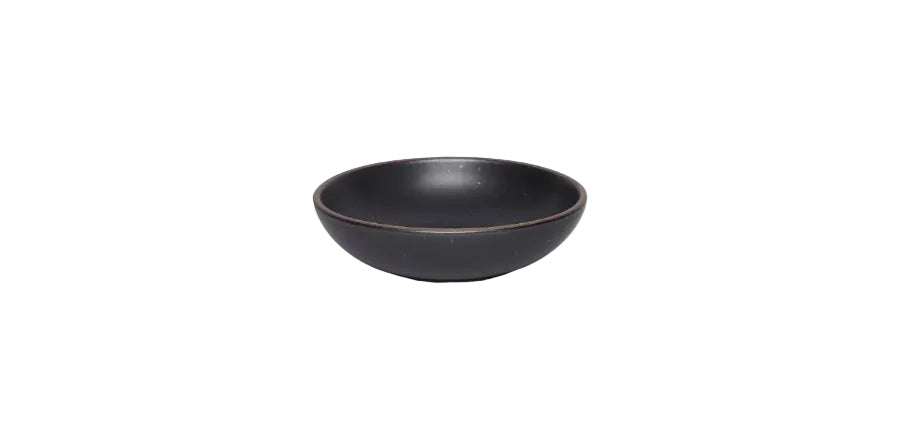 Black ceramic bowl on a white background