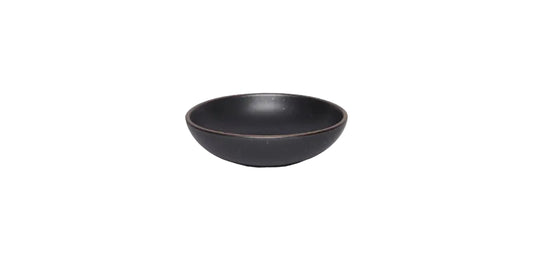 Black ceramic bowl on a white background