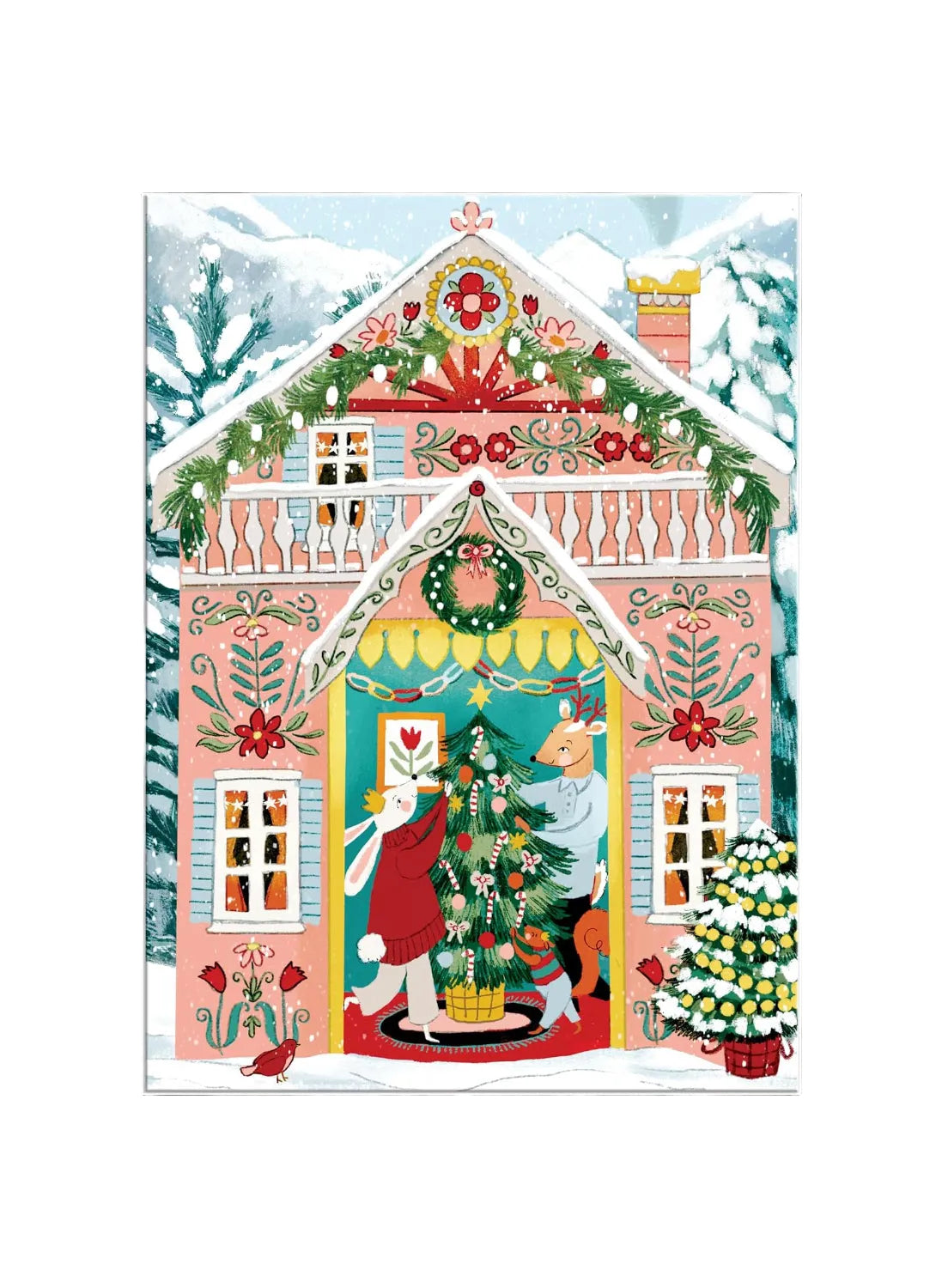 A colorful folk-art style illustration of a snow-covered pink house decorated for Christmas, with a wreath, garlands, windows, and a festive doorway where a rabbit and a cat are decorating a Christmas tree.