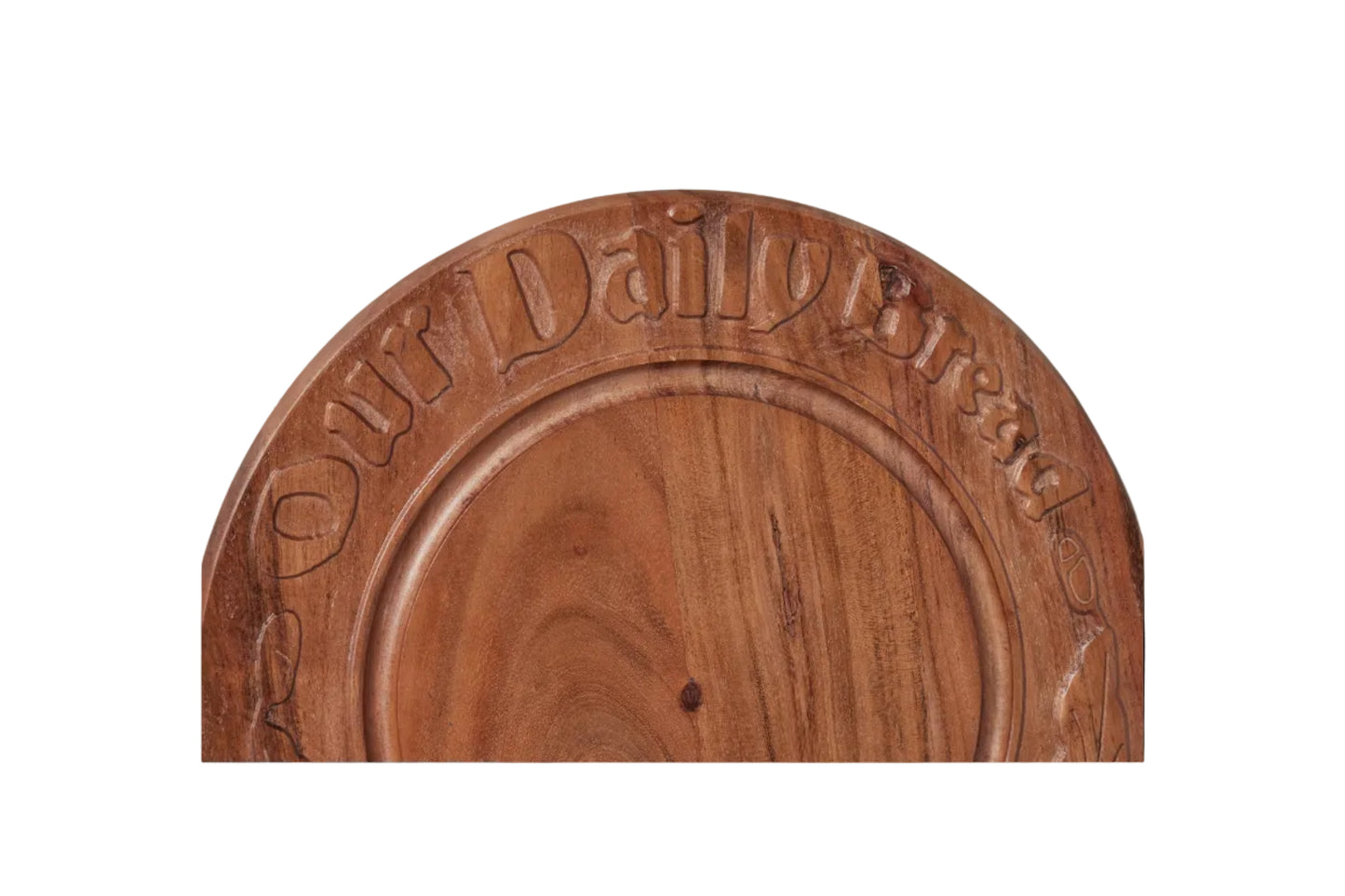 Wooden sign with 'Our Daily Bread' engraving on a gray background