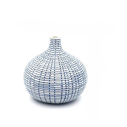 Decorative vase with a textured pattern on a white background