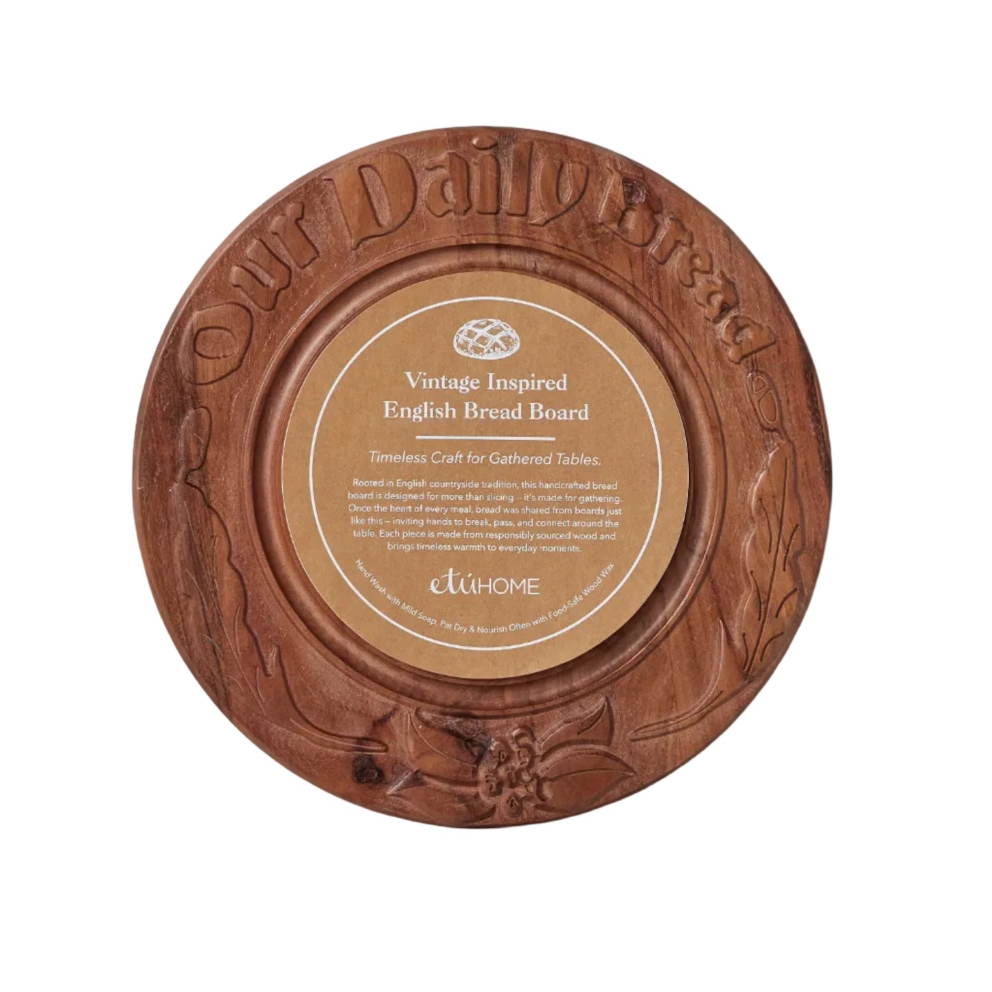 Wooden bread board with embossed design on a gray background