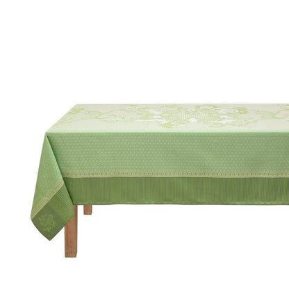Green tablecloth with floral pattern on a white background
