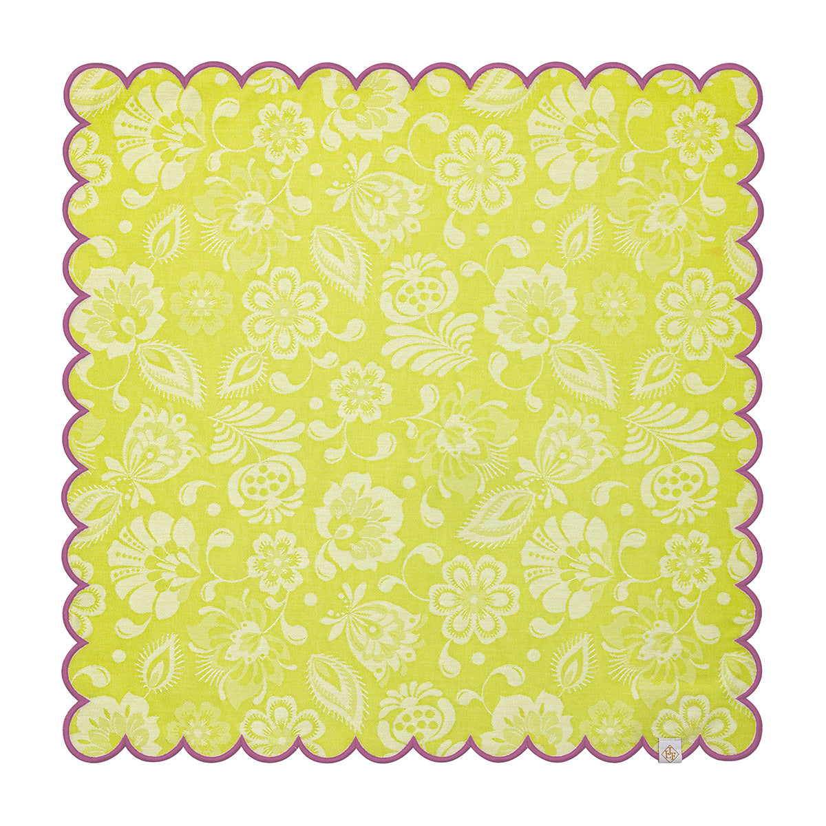Floral patterned fabric square with scalloped edge on a white background