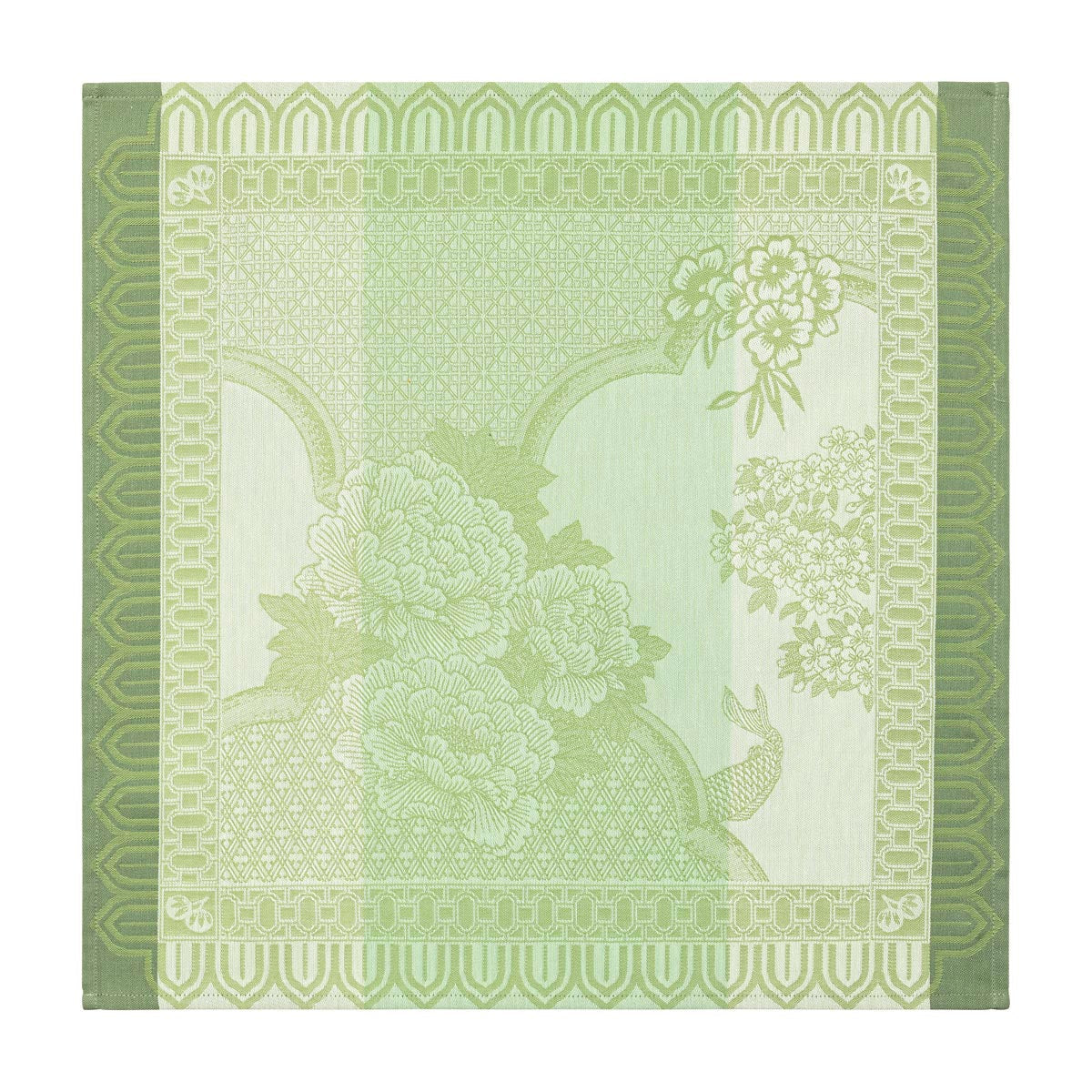 Decorative green napkin with floral and geometric patterns on a white background