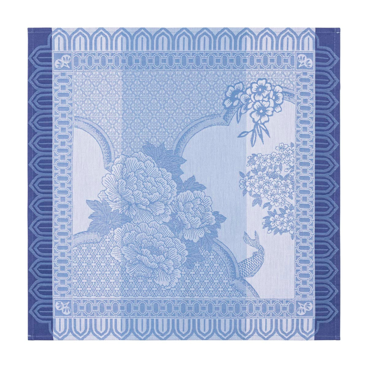 Decorative blue and white fabric with floral and geometric patterns