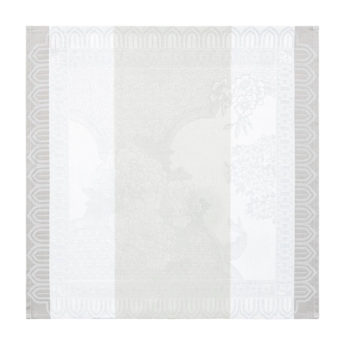 White quilt with geometric gray border on a white background