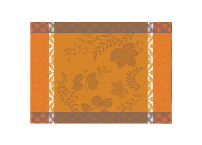 A square decorative pattern tile featuring a central mustard-orange field with muted brown leafy vine motifs, bordered by orange panels and gray-and-white patterned bands.