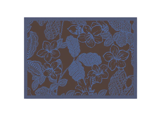 A close-up of a floral pattern featuring light blue plumeria flowers and leaves on a dark brown background, framed by a thin dark blue border.