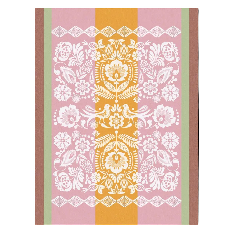 Decorative book cover with floral and paisley patterns on a pink and brown background