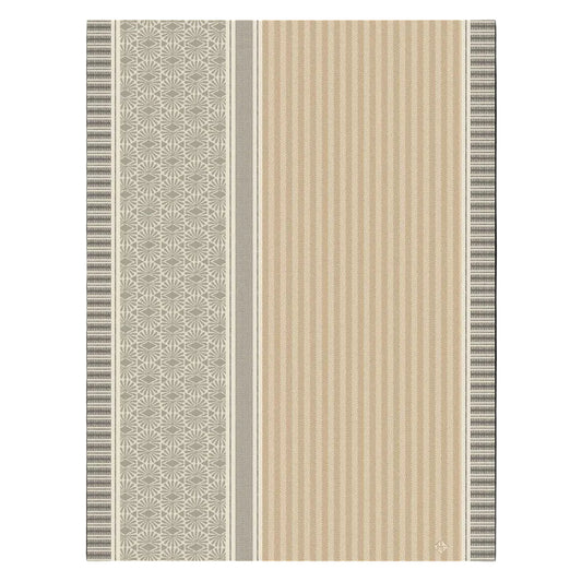 Patterned fabric with vertical stripes and geometric designs on a beige background