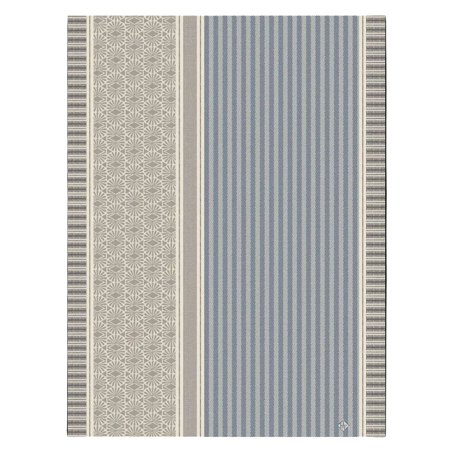 Patterned fabric with geometric design on a blue background