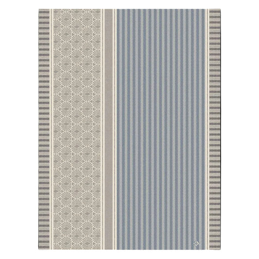 Patterned fabric with geometric design on a blue background