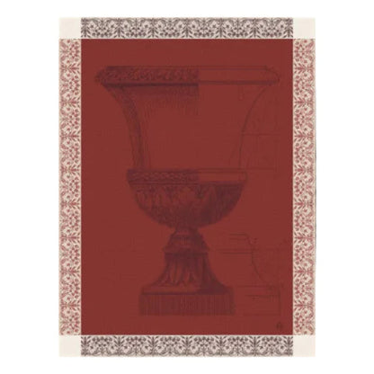 a classical urn illustration in dark brown linework over a solid deep red background, framed by a decorative beige and brown patterned border.