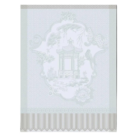 Decorative wallpaper with a chinoiserie design featuring a pagoda and floral elements on a light gray background.