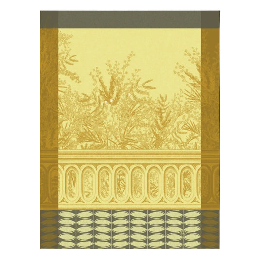 A decorative wallpaper or fabric swatch featuring a warm yellow background with a gold toile-style botanical pattern, ornate border bands, and a geometric scallop pattern at the bottom.